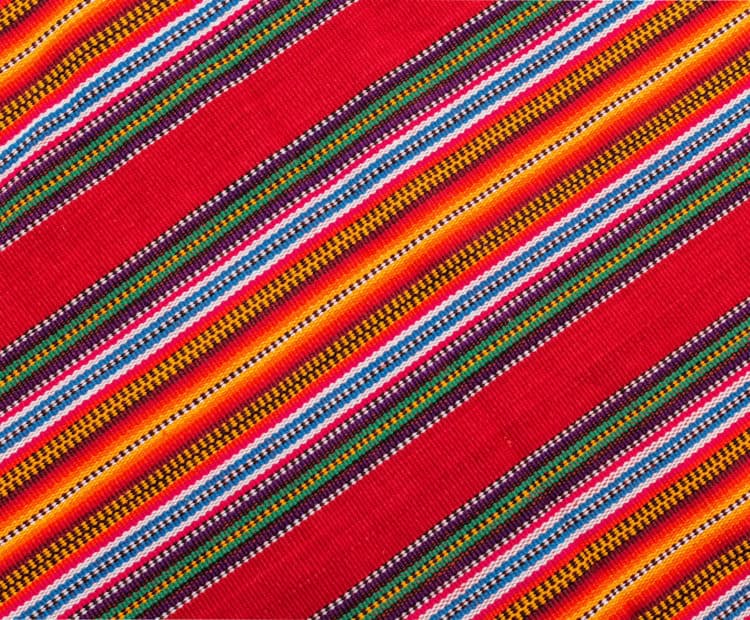 A colorful woven textile pattern.