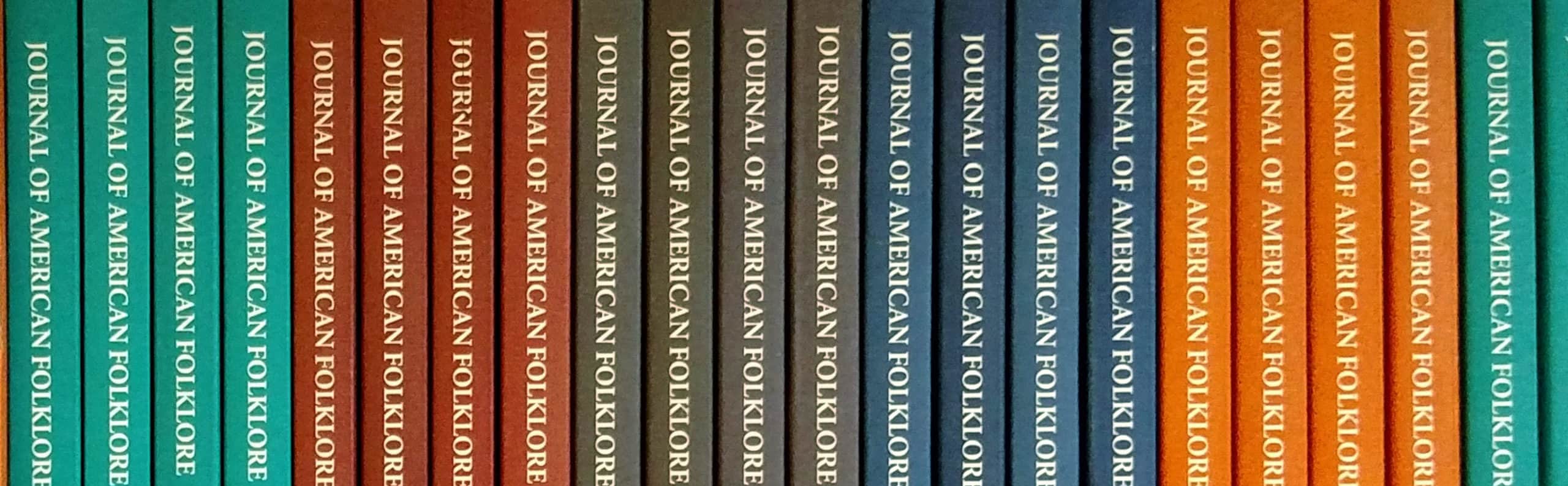 Books lined up on a shelf.