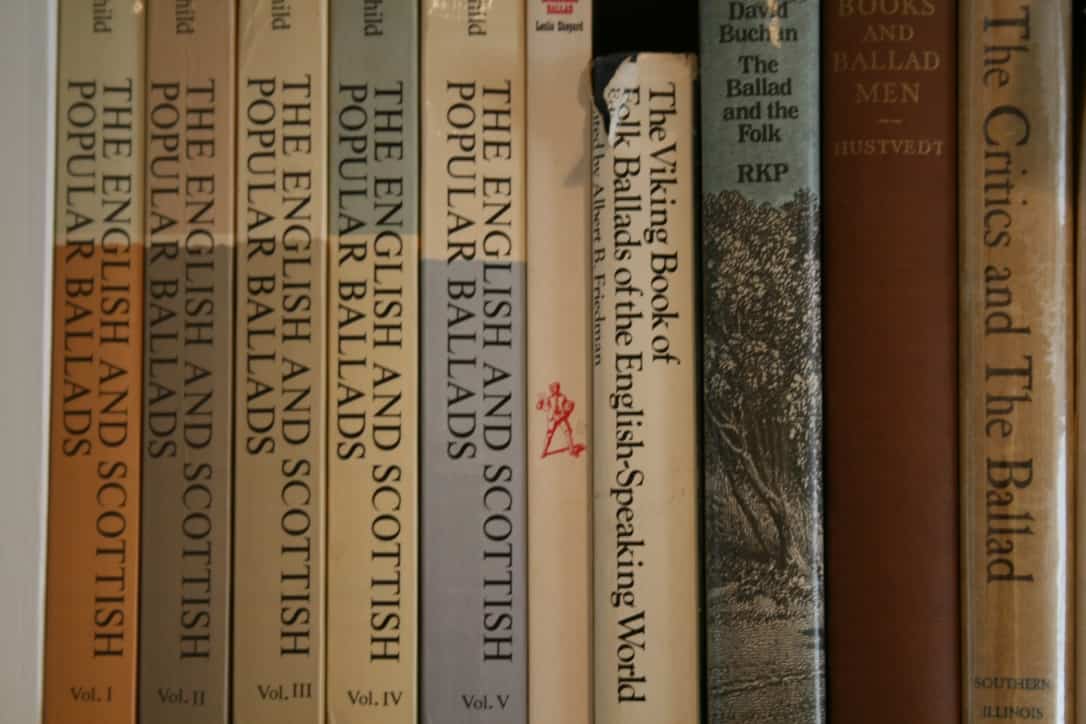 Spines of books about ballads, including Child's English and Scottish Popular Ballands