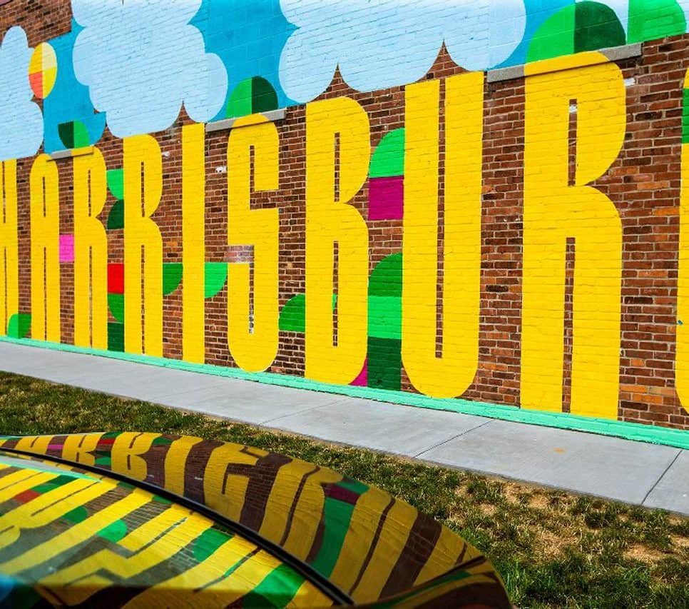 mural on brick wall says Harrisburg in large letters
