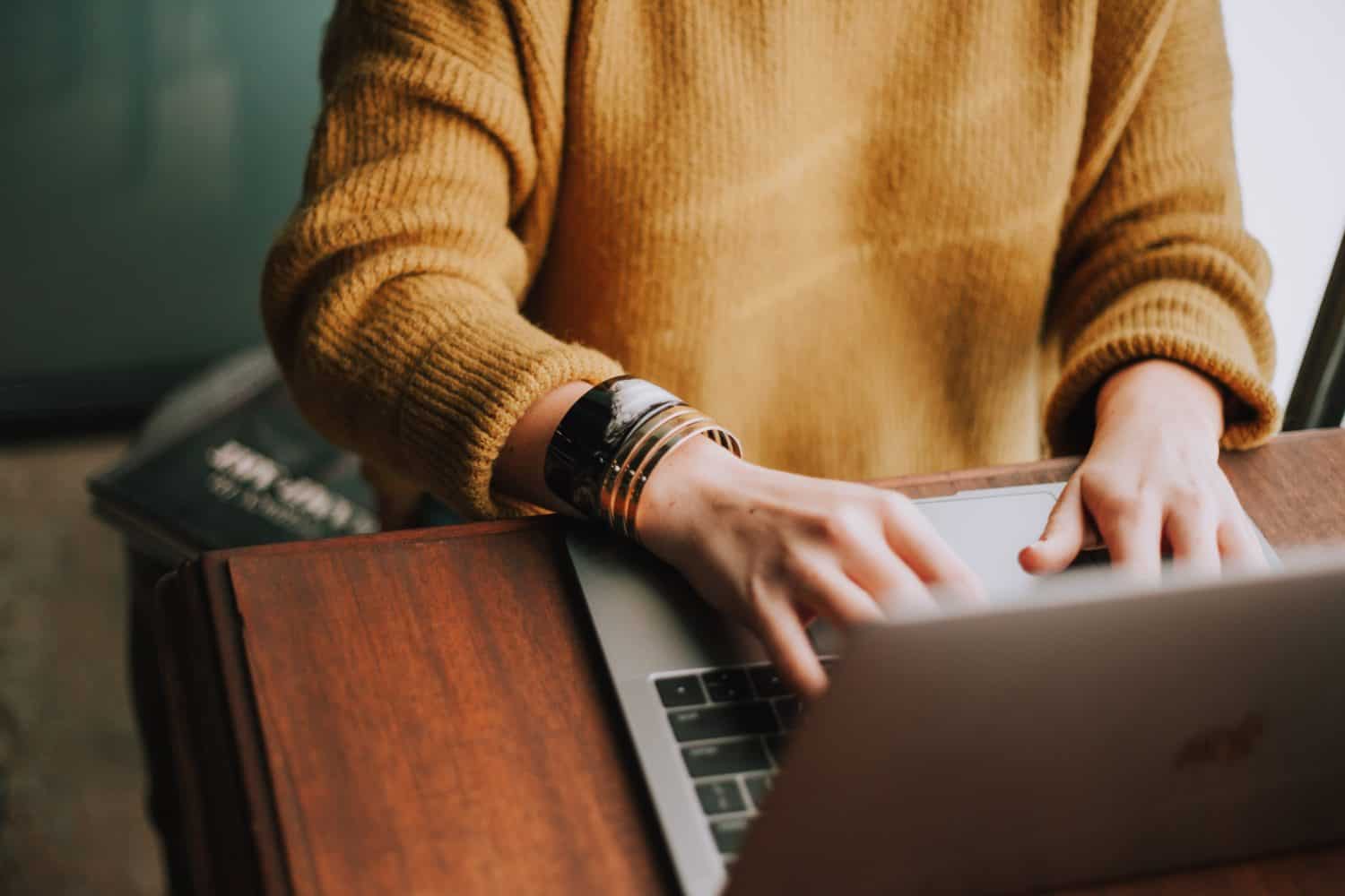 Woman sitting at computer