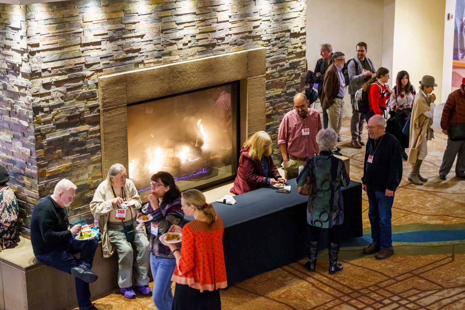 Folklorists mingling in the lobby of the Albuquerque Convention Center for the 2024 Annual Meeting.