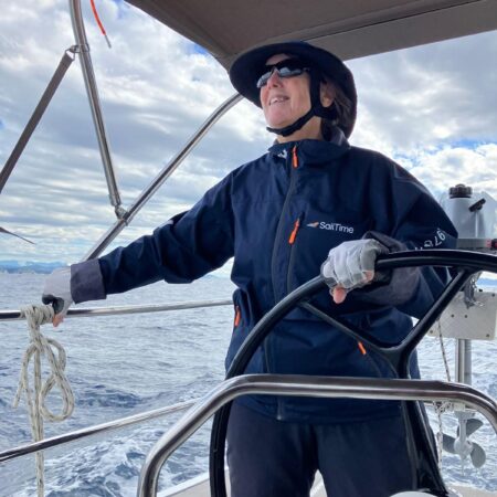 amy skillman driving a boat